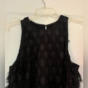 Anthropologie black cocktail dress with fringe detail. Size 8.